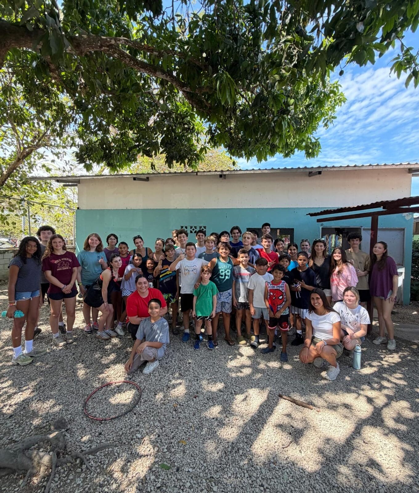Group photo with local kids at the school